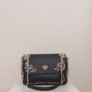 Black faux leather Betsy Johnson bag